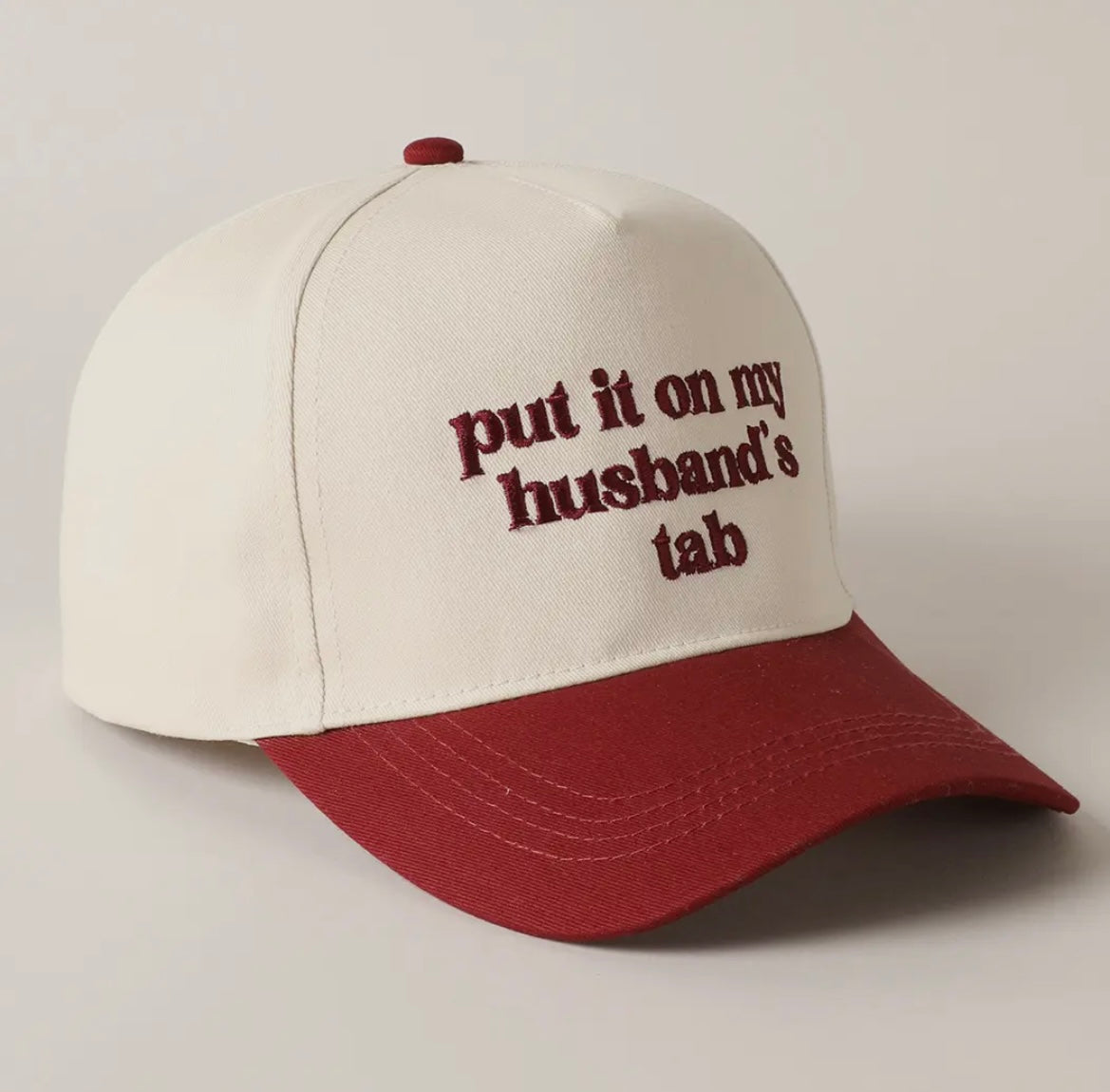 Put It On My Husband’s Tab Trucker Hat