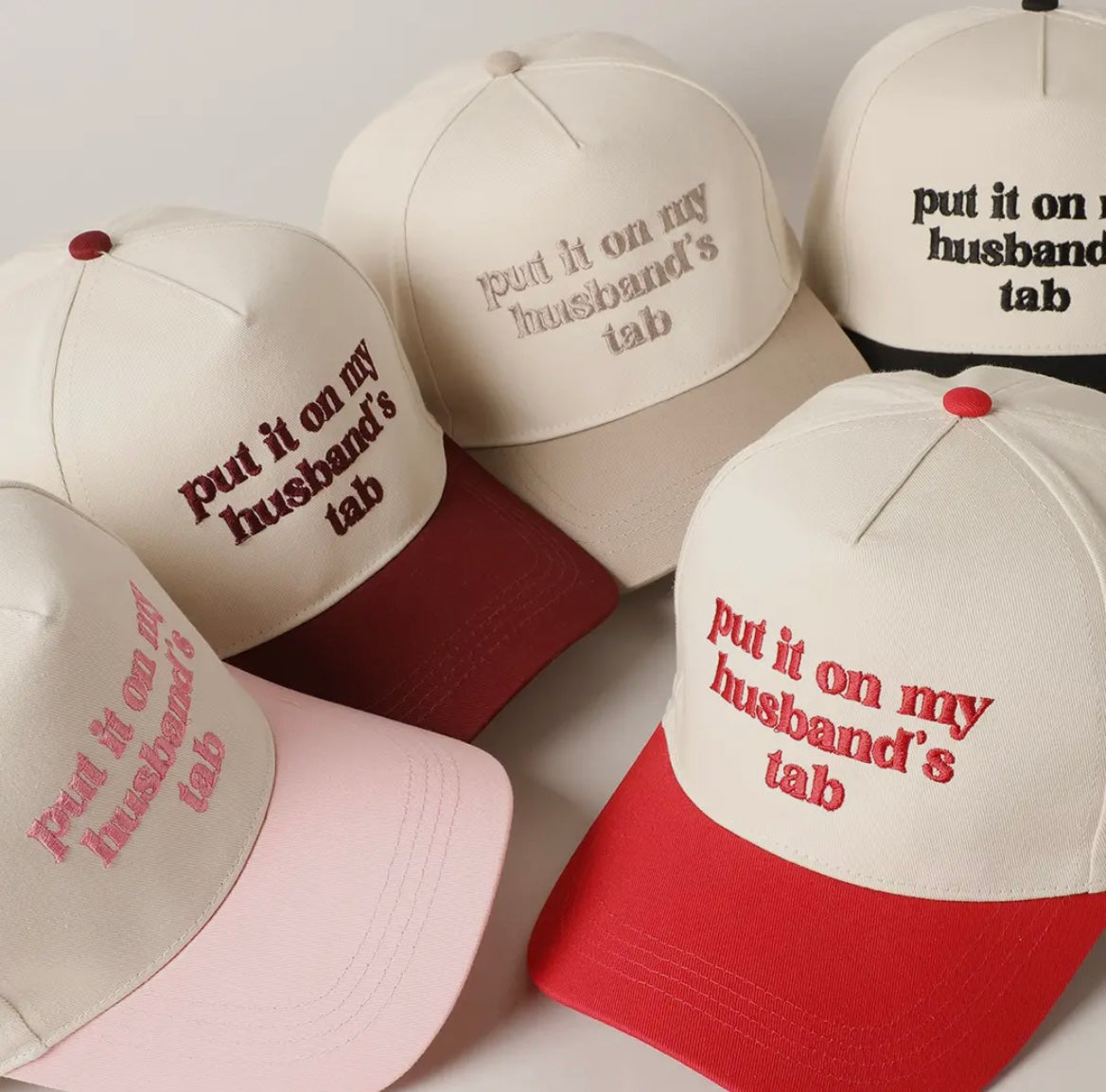 Put It On My Husband’s Tab Trucker Hat