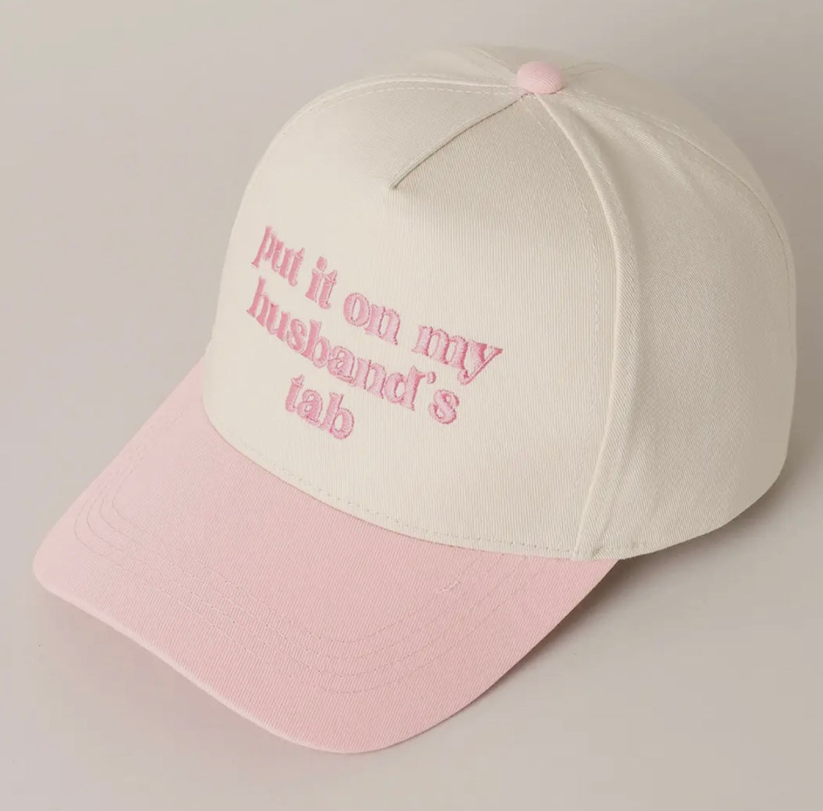 Put It On My Husband’s Tab Trucker Hat
