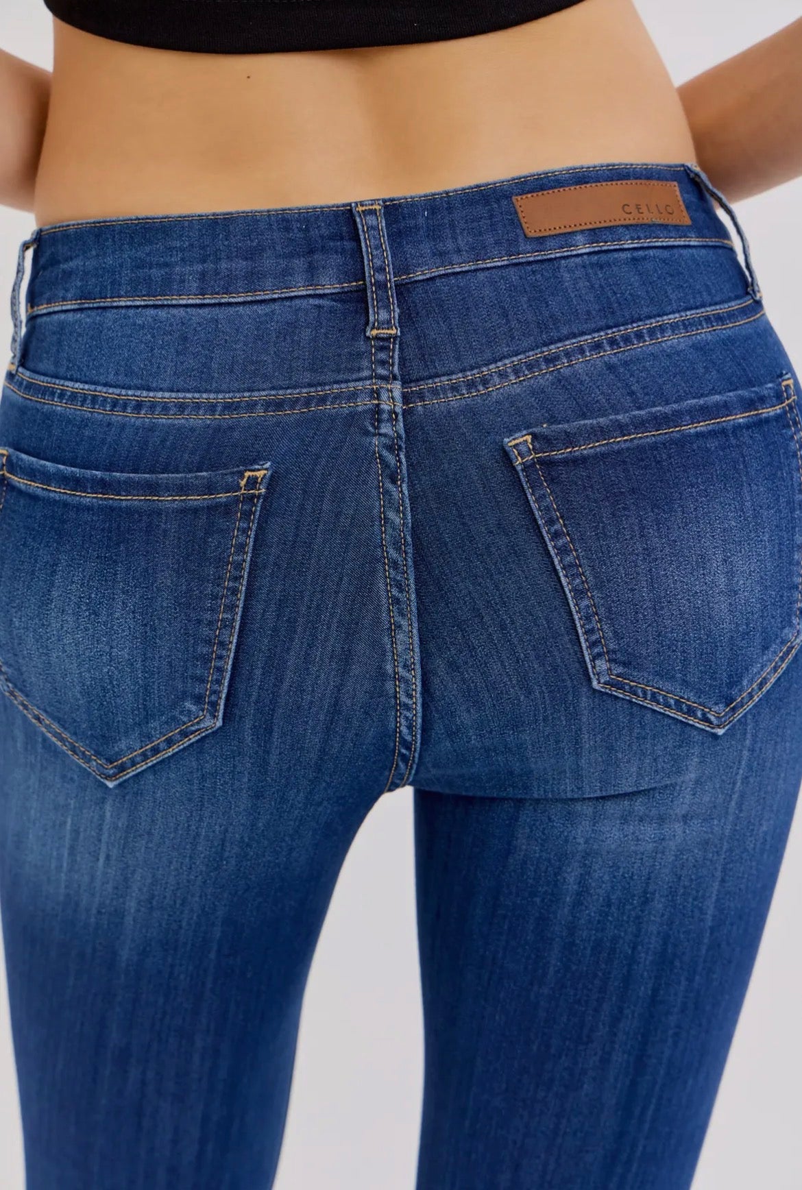 Braelynn Petite Mid Rise Flare Jeans