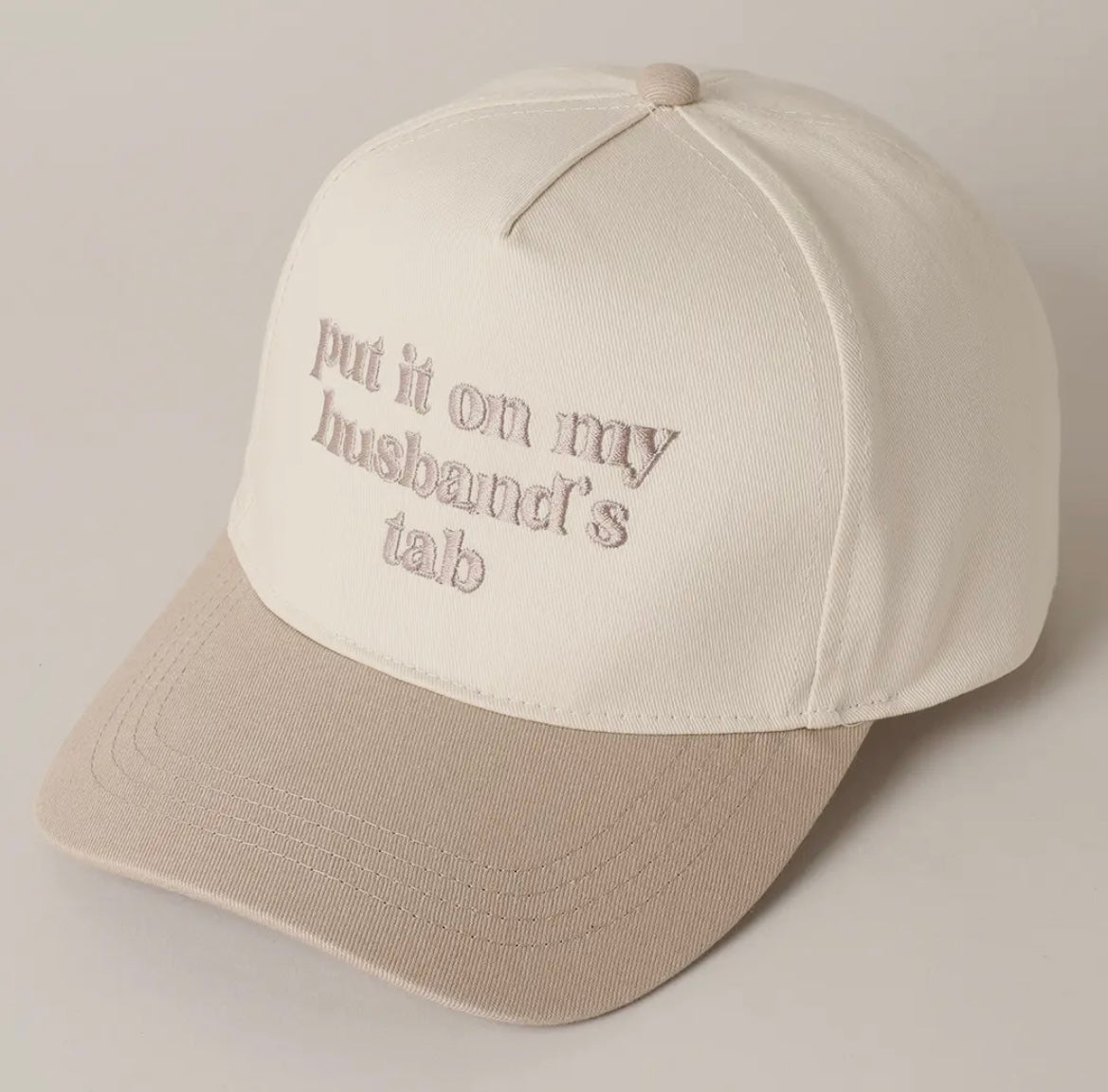 Put It On My Husband’s Tab Trucker Hat
