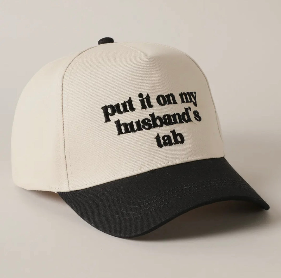 Put It On My Husband’s Tab Trucker Hat
