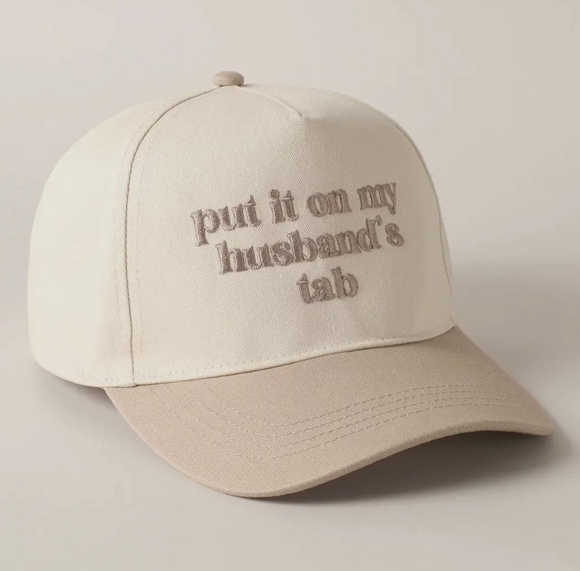 Put It On My Husband’s Tab Trucker Hat