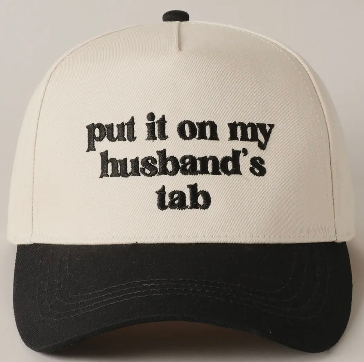 Put It On My Husband’s Tab Trucker Hat