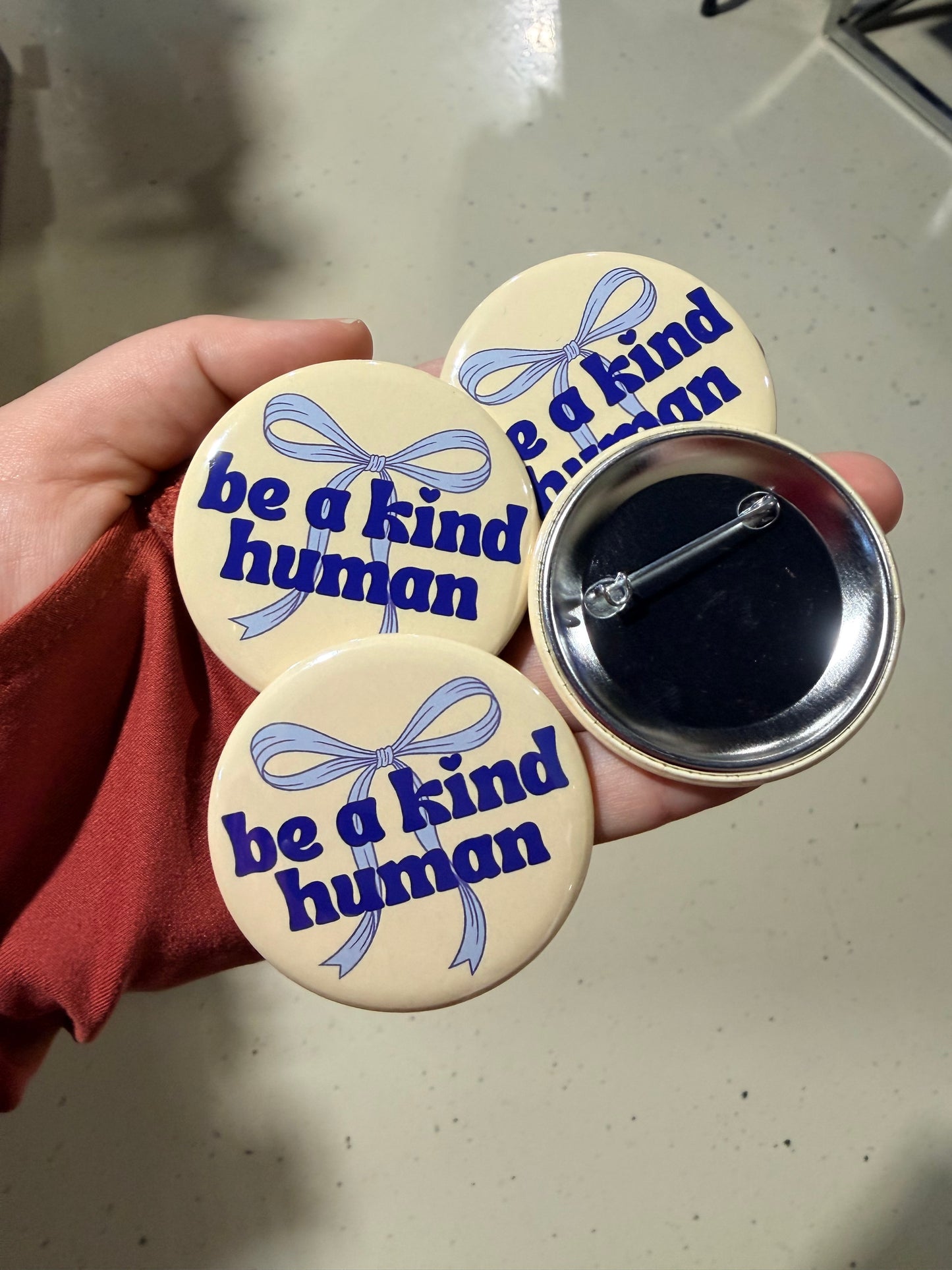 Coquette Be a Kind Human 2.25” Button Pin