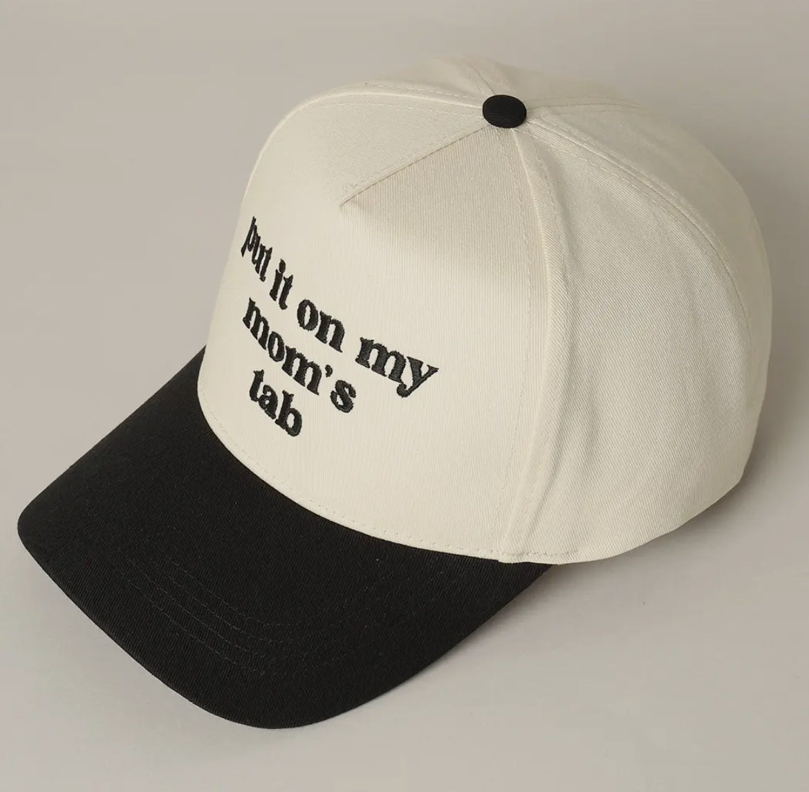 Black Put It On My Mom’s Tab Trucker Hat