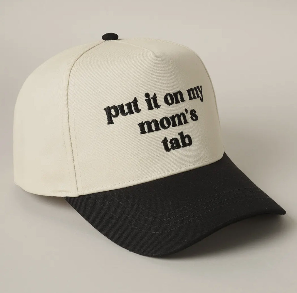 Black Put It On My Mom’s Tab Trucker Hat