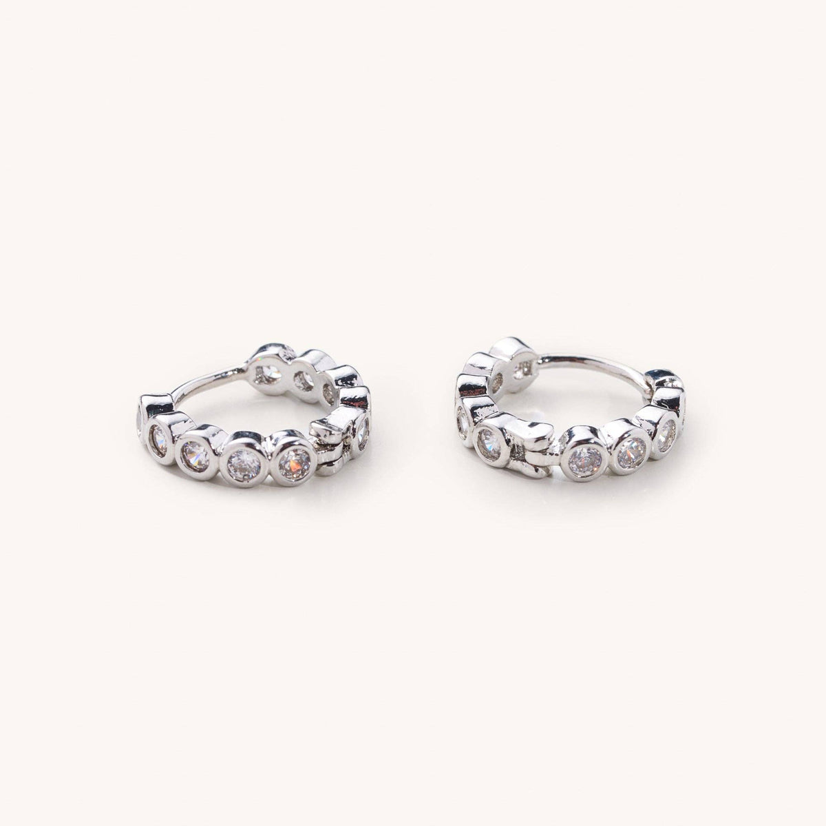 Celia Circle Gem Huggies- Silver